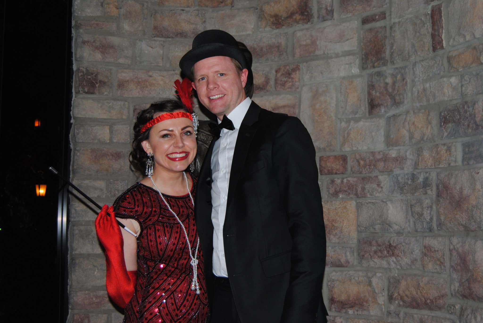 Couple out on roaring 20's date night. 
