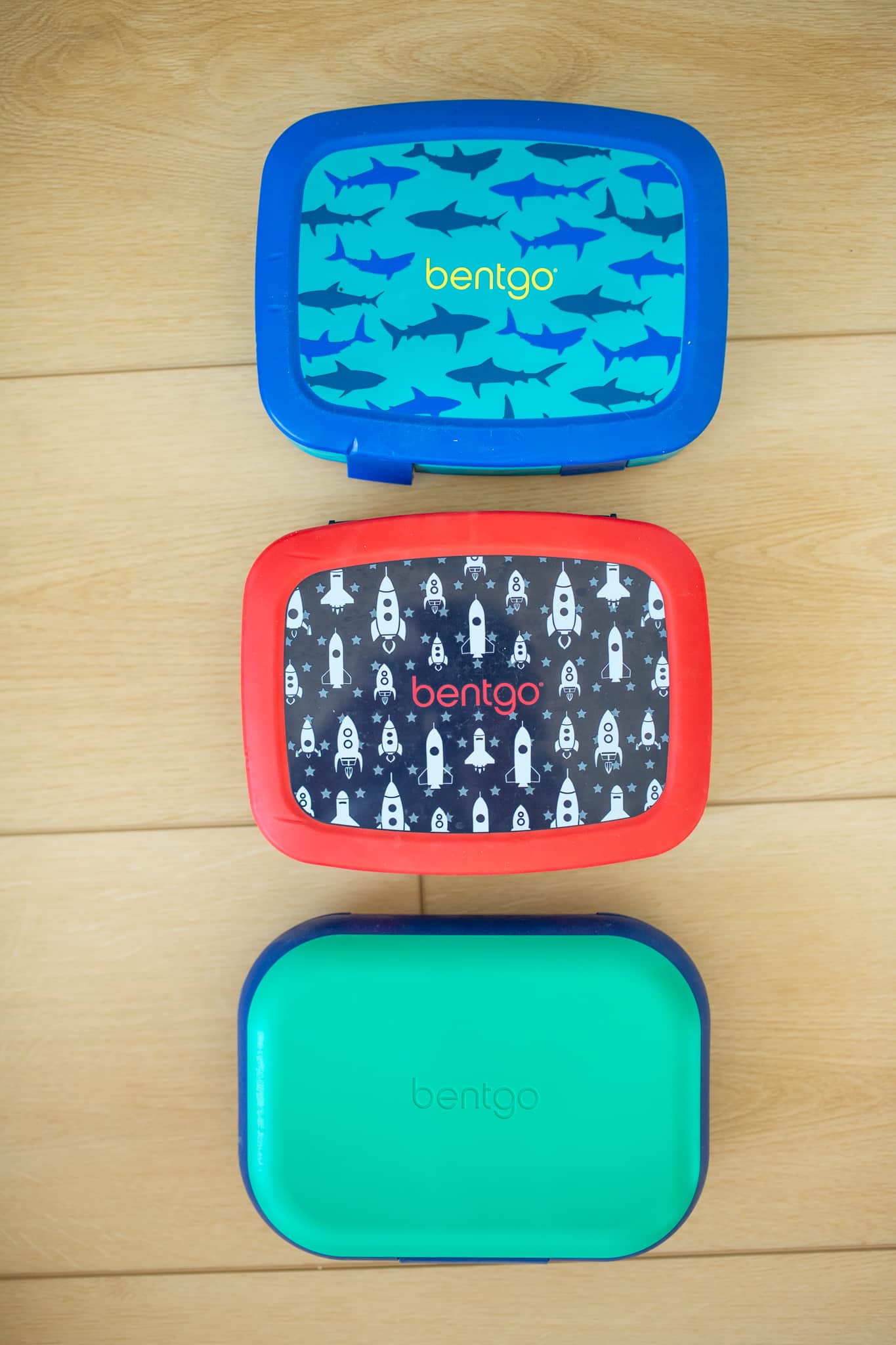 Types of Bentgo Lunchboxes including Bentgo Kids and Bentgo Chill lunchboxes in a row. 