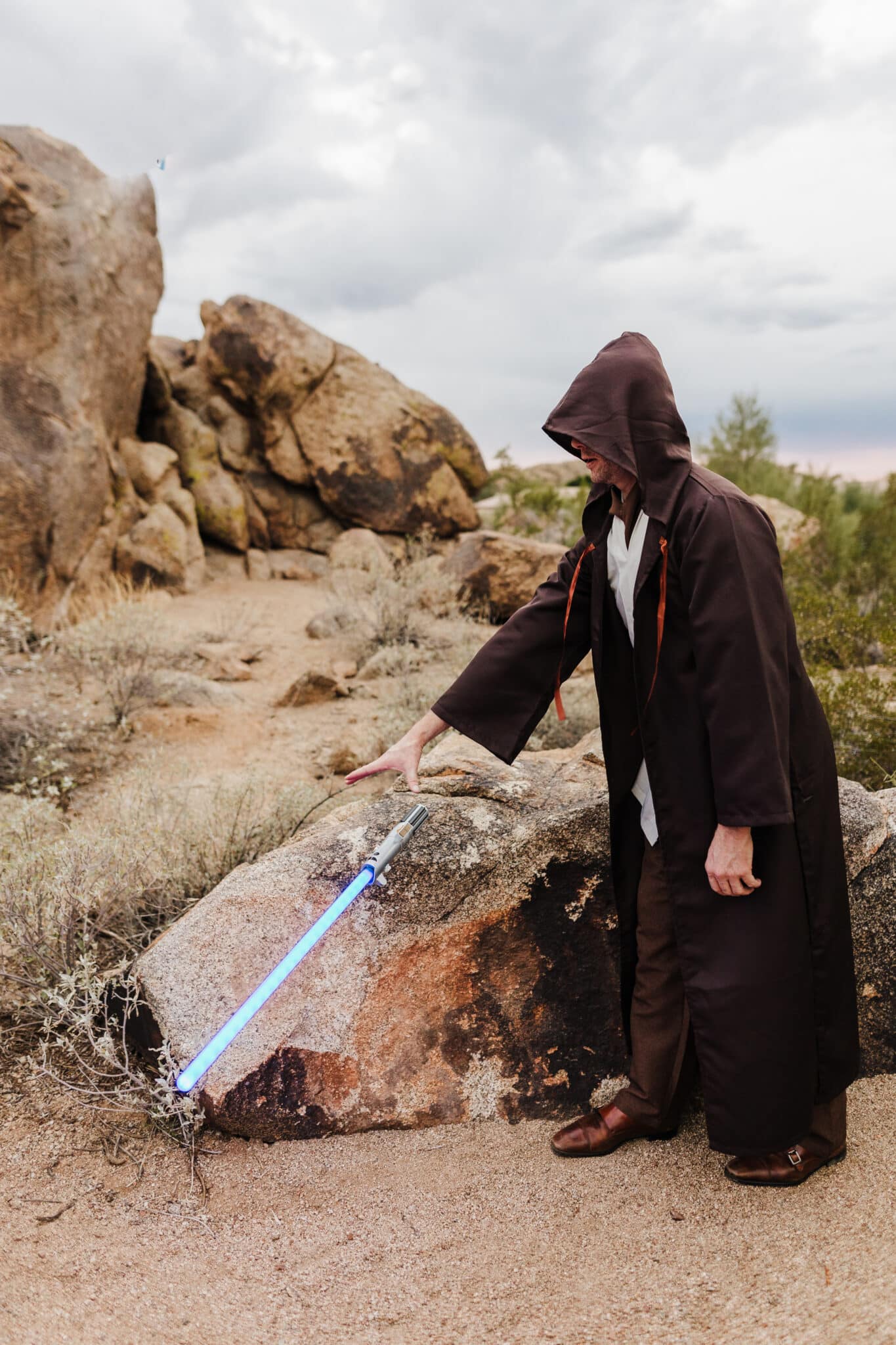 A man in Jedi robes showing Jedi costume ideas. 