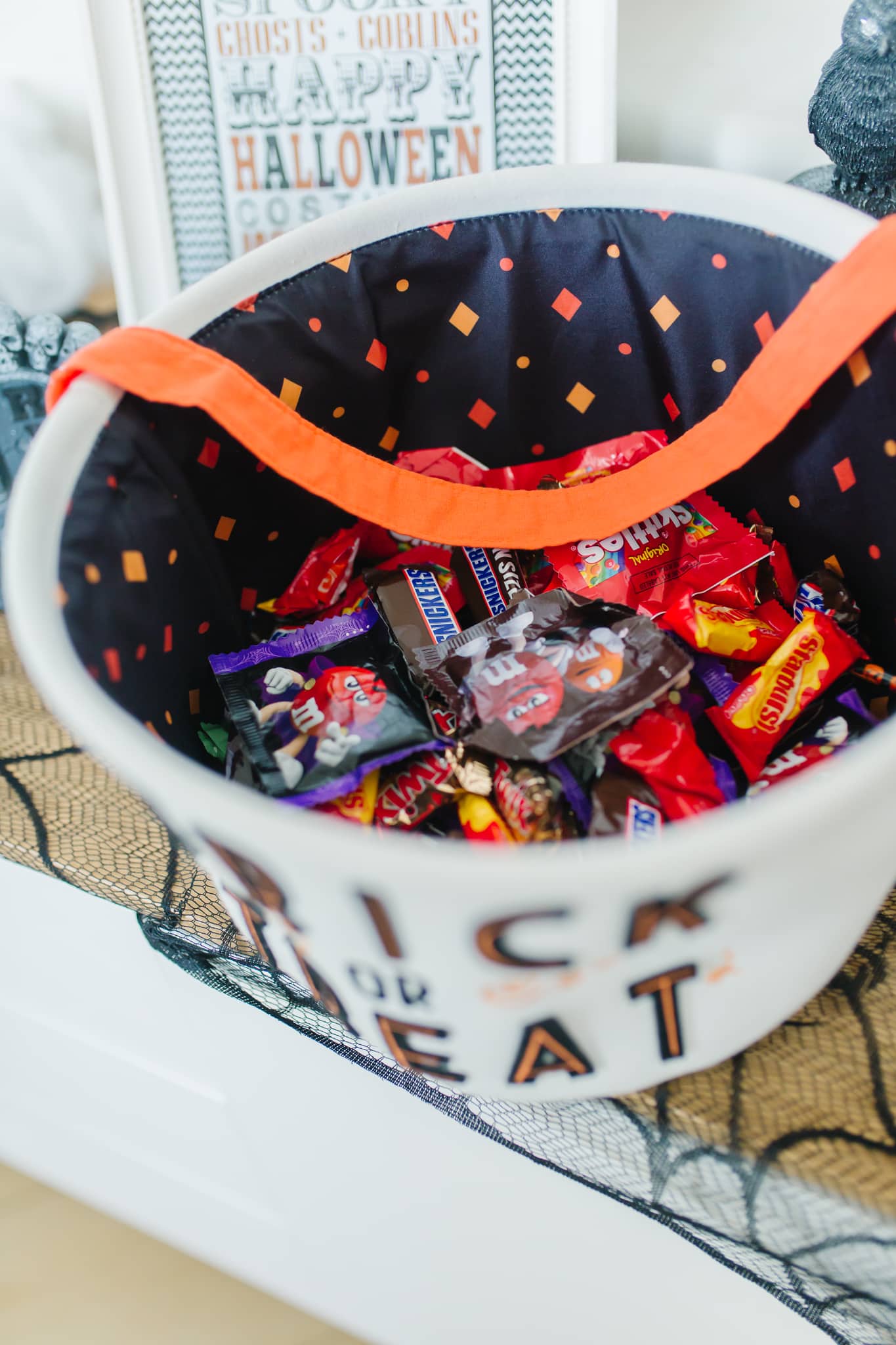 Where to donate halloween candy: a basket full of Halloween candy. 