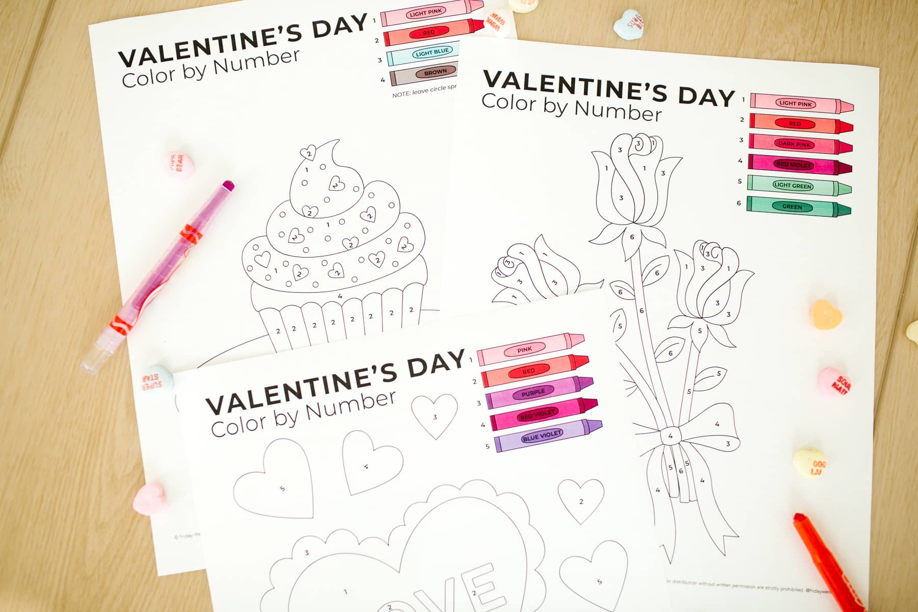 Color by Number Valentines printed out with crayons. 