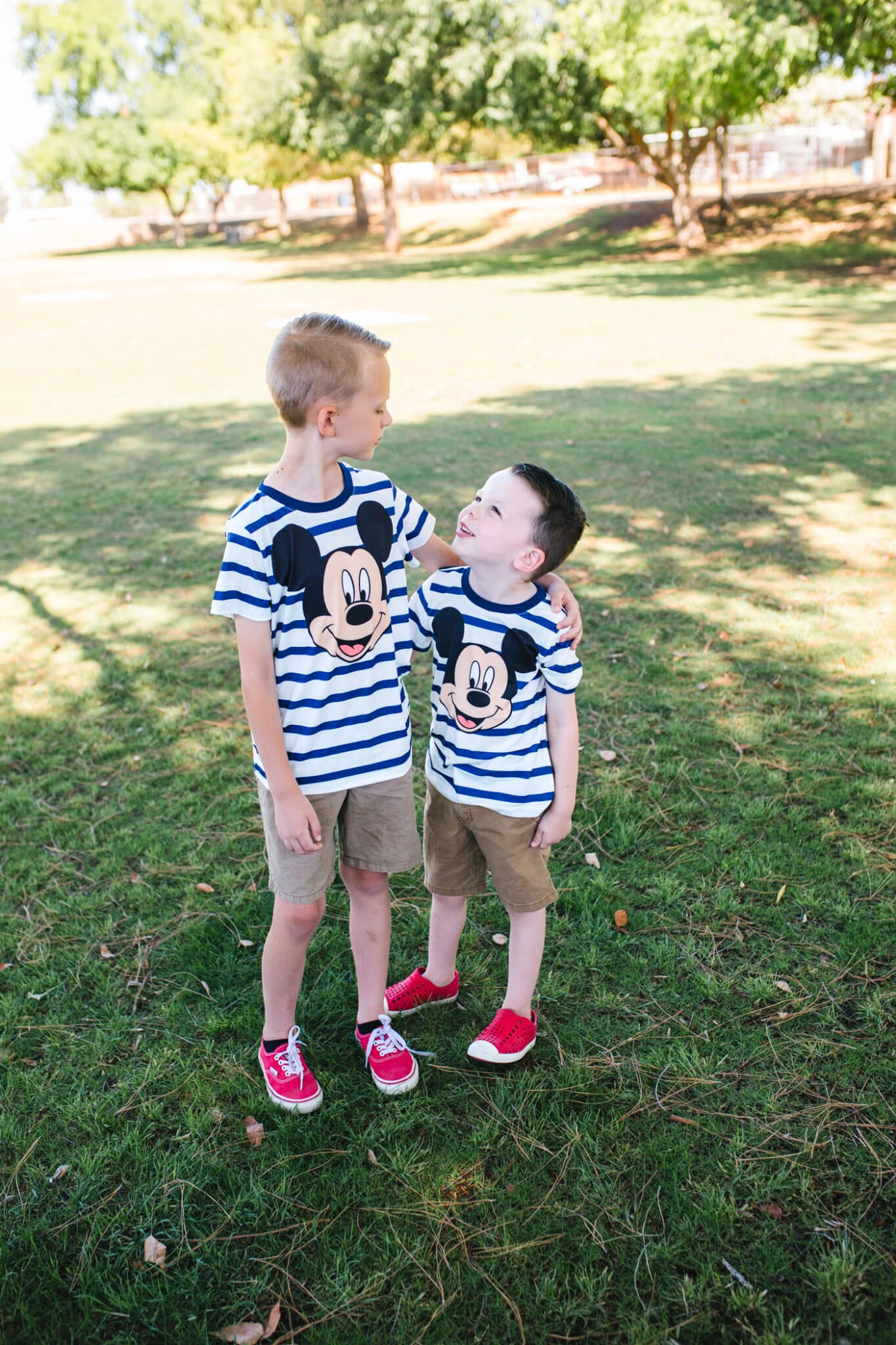 Boys ready for Disneyland in cute Disney shirts for kids. 