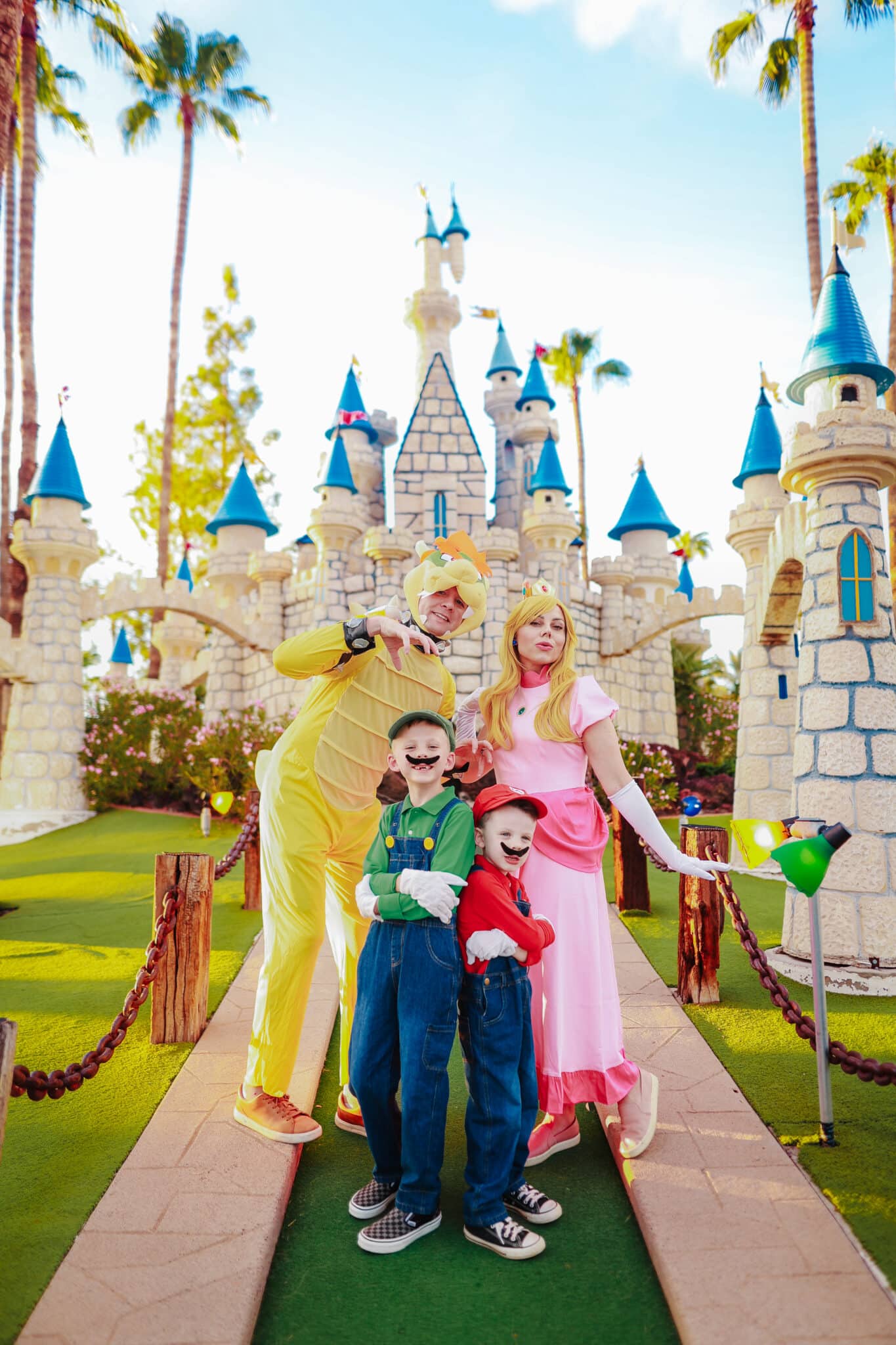 Family dressed in a Super Mario Family Costume.