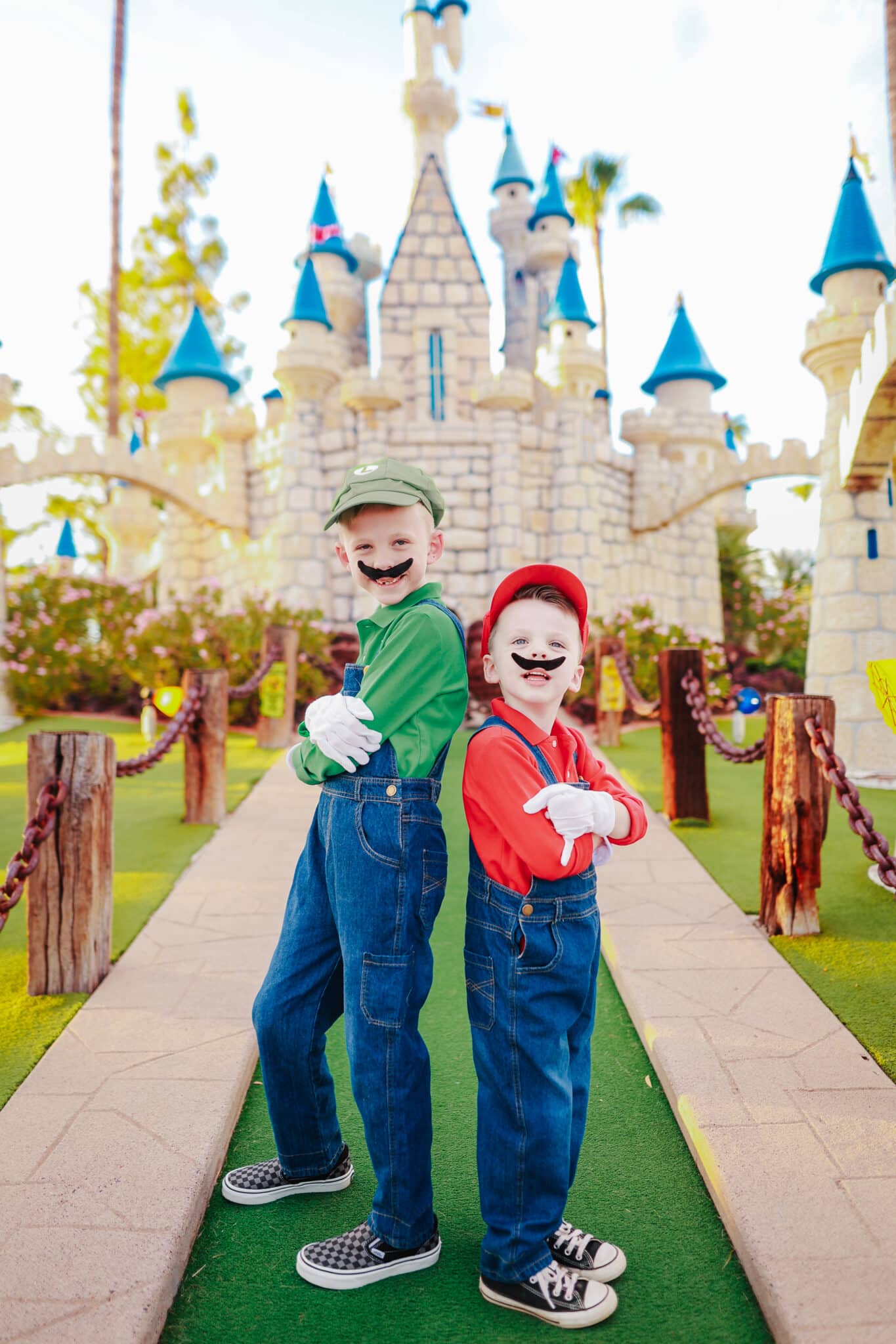 Brothers dressed in Mario and Luigi Costumes. 