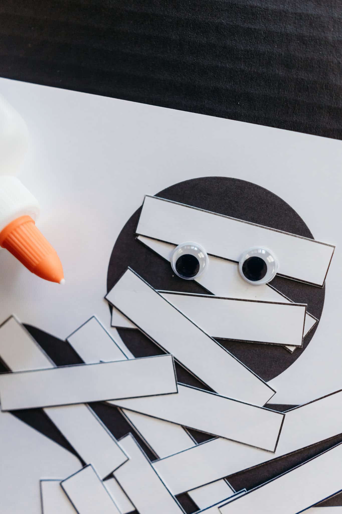 Mummy craft using a printable mummy template.