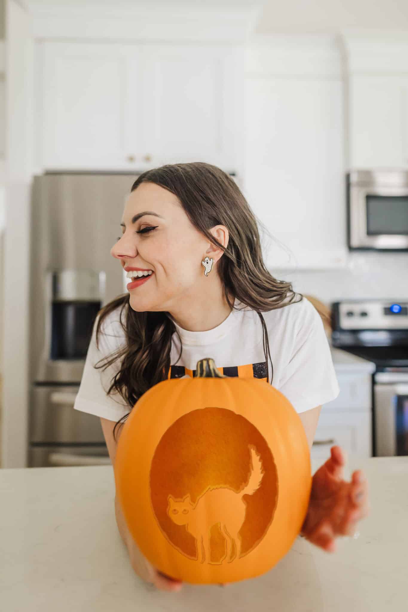 Pumpkin carved with a Pumpkin Carving Cat Pattern. 