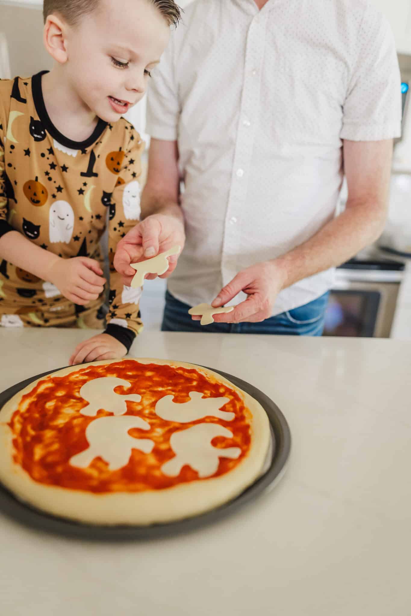 Preparing a Spooky Halloween Pizza.