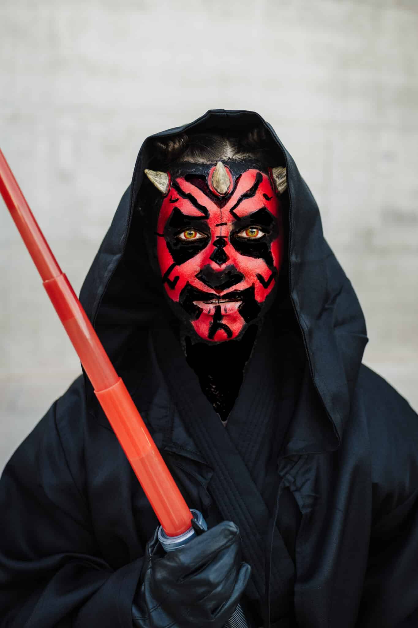 Star Wars Villains costume featuring a Darth Maul costume with hood and sith costume robes.
